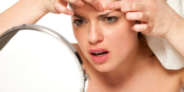 Is popping pimples bad for you?